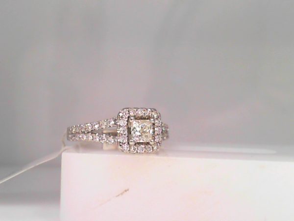 Lady's White 14 Karat Contemporary Engagement Ring Size 5 With One 0.30Ct Princess I Si1 Diamond And 0.28Tw Round Diamonds
GIA Inscription on center stone 2195428120