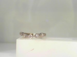 Lady's White 14 Karat Curved Half Wedding Band Size 5 With 6=0.45Tw Trillian Diamonds