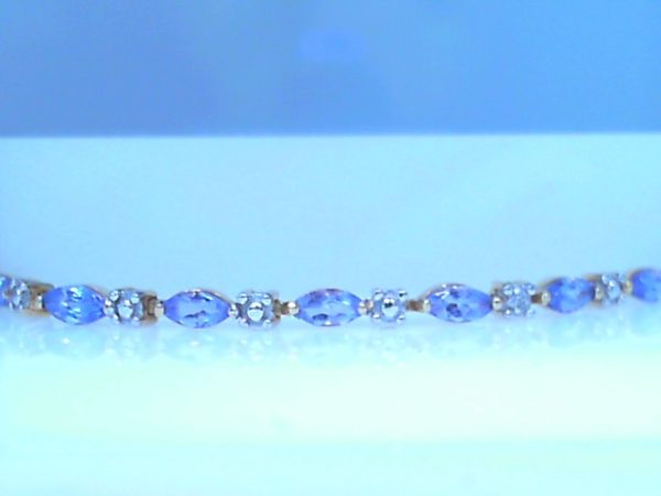 Lady's Yellow 10 Karat Tennis Bracelet Length 7 With Marquise Tanzanites