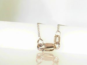 White 14 Karat Flat Curb Chain Length 18
MM Width: 0.5 with Lobster Clasp
