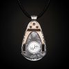 William Henry is proud of our American heritage, and we pay homage to the strength and ideals that created the dream we all share. The Denali is a striking pendant wrought in sterling silver with artwork that captures the iconography of our history. A wishbone clip in PVD black coated stainless steel holds one to three guitar picks, and whether you play guitar or you don’t, this piece is gorgeous on the neck. Finished with a fine stitched leather cord and sterling silver clasp, entirely built in our Oregon studio. - Image 4