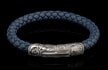 The Blue Ridge brings our honored American heritage to life, timeless images sculpted from generations past, and for generations into the future. This bracelet features a beautifully carved centerpiece/clasp in sterling silver with a double secured magnetic closure. The antique white of the sterling is the perfect pairing to a supple and durable 8mm braided leather cord in an earth-tone blue/gray that wears well with any outfit, on any occasion.