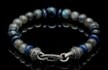 William Henry Magician Bracelet, Labradorite- 8mm, Sodalite -9mm, Blue Tiger Eye
Let the blues reign! The Magician features a gorgeous palette of blues and greys, including labradorite and sodalite beads along with blue tiger eye. Crafted in our Oregon studio on aircraft grade stainless cable with welded sterling end caps and clasp, designed and built for generations. This bracelet is striking with a suit, with denim, and everything in between. Solo or stacked…there are only right answers.