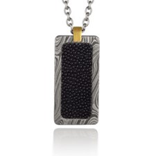 Damascus Dog Tag with Black Stingray Inlay
SKU: PN-066-Y
TAGS: Damascus, Dog Tag, Inlay, Stingray

Metals: 18K yellow gold, Damascus Stainless Steel

Finish: Black oxide, matte

Inlay: Black Stingray hide, sustainably farmed, natural variation occurs

Measurements: 20mm x 40mm x 3.2mm

30" Stainless Steel  cable link chain