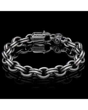 CRETE This bracelet is our take on a staple pattern in the world of fine chains, the rolo. We took the predictable rolo chain, broke it apart, re-imagined each link as a piece of sculpture, and rebuilt this exceptional design. Soft oxidized, hand polished, finished with our custom sterling silver lobster clasp, bold enough to command center stage but demure enough to share the spotlight – a piece that will become a quick favorite.

Product SKU: BR30

MATERIALS
Sterling Silver
FEATURES & SPECS
Chain width: 10.8mm