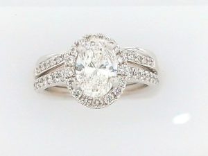 Lady's White 14 Karat Wedding Set Wedding Band Size 7 With One = 1.02Ct Oval G/H Si1 Diamond And 55 = Round Diamonds Gram Wt: 6.46
