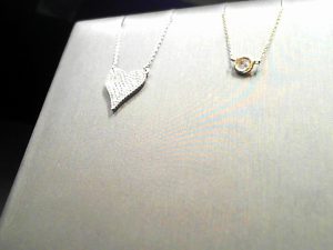 Lady's White 14 Karat Heart Pendant Length 18 With 0.06Tw Round Diamonds Style: Cable Link
Metal: 14 Karat
Color: White
Finish: Polished