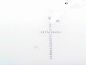 Lady's White 14 Karat Small Diamond Cross Pendant With 30 = 0.06Tw Round G/H Si1 Diamonds Gram Wt: .34