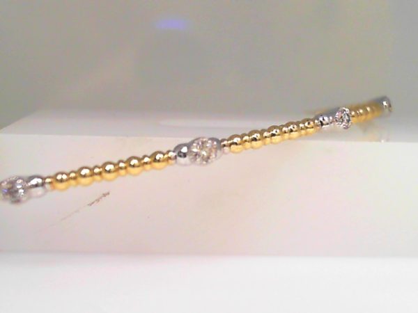 Lady's Yellow 14 Karat Bangle Bracelet With 1.50Tw Round G/H Si2 Diamonds