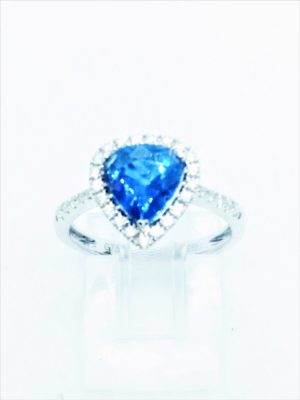 Lady's White 18 Karat Halo Fashion Ring Size 6.5 With One 2.42Ct Pear Blue Strong Sapphire And 31=0.30Tw Round F/G Si1 Diamonds
MM Width:  Shank 2.12
Gram Weight: 3.22