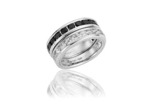 Sterling Silver, Stackable Channel set ring with White Topaz
Size 7
Photo shows Topaz ring stacked with another ring