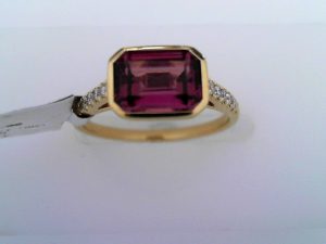 Lady's Yellow 18 Karat Bezel Set East To  West Cathederal  profile Fashion Ring Size 6.5 one = 1.90ct Emerald Purple Rhodolite Garnet
12 = 0.12tw Round F/G SI1 Diamonds