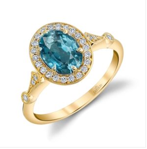 Lady's White 18 Karat Halo Fashion Ring Size 6.5 one = 1.95ct Oval Blue Blue Zircon
26 = 0.16tw Round G/H SI1 Diamonds Gram Weight: 3.15
* Color of Metal may varie