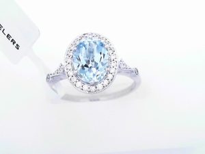 Lady's White 14 Karat Oval AQUA With Diamond Halo Fashion Ring Size 6.5 one = 1.30ct Oval Bluish Green Moderately Strong AQUA
26 = 0.16tw Round G/H SI1 Diamonds Gram Weight: 2.87