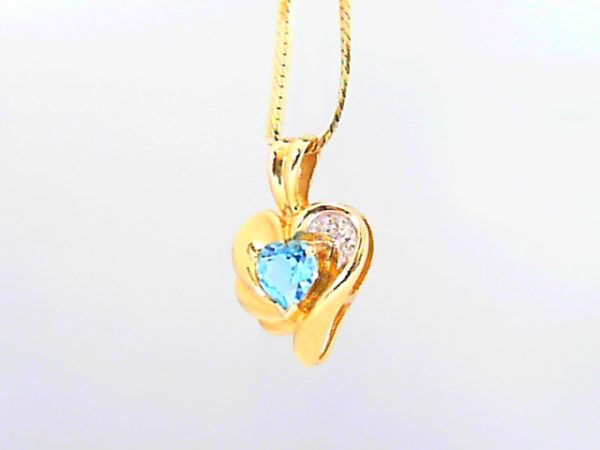 Lady's Yellow 14 Karat Heart Pendants Length 18 With One Heart Blue Topaz And 3= Round Diamonds Style: Herringbone
Metal: 14 Karat
Color: Yellow
Finish: Polished