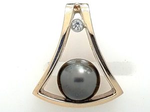 Lady's Yellow 14 Karat Tahitian Pearl Pendants With One = Round Diamond And One = 10.00Mm Tahitian Pearl  8.35 grams