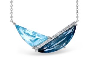 Lady's White 14 Karat Blue Topaz Art Deco Style Free Form Necklace 18" cable Chain, one 2.50ct  London Blue Topaz
one 2.16ct  Sky Blue Topaz
0.09tw Round G SI1 Diamonds