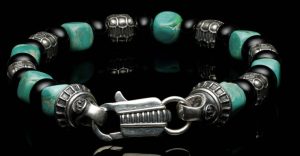 Lady's White Sterling Silver Shadowline Bead Bracelet Bracelet Length 8.5

Featuring Kingman turquoise cube beads, polished black onyx rondelles, and sculpted sterling silver quilted cube beads—finished with a custom clasp.

Bead sizes:
Turquoise cube: 7-8mm
Black Onyx: 8mm

Silver: 6mm