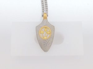 Lady's Two Tone 18 Karat Yanone Charm Style: cable
Metal: stainless
Color: White
Finish: Polished