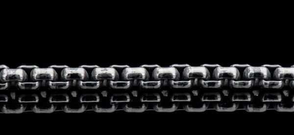 The complex geometry of each link presents as a simple, timeless piece that is finished with a gentle oxide and hand polish that beckons you closer, true to William Henry’s renowned style. Our custom lobster clasp, also sculpted in sterling silver, completes the presentation. - Image 2
