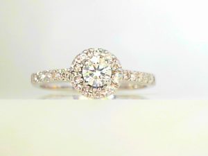 Lady's White 14 Karat Halo Engagement Ring Size 7.5 one 0.21ct Round I I2 Diamond
21=0.30tw Round I I1 Diamonds
