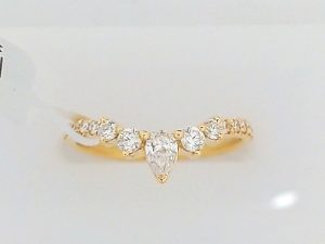 Lady's Yellow 14 Karat Diamond Band Wedding Band Size 6.5 With 16 = 0.28Tw Round Diamonds And One = 0.16Ct Pear Diamond