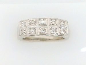 Lady's White Platinum Channel Set Wedding Band Size 6.25 With 10 = Round Diamonds Gram Wt: 7.84