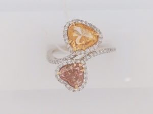 Lady's White 18 Karat Contemporary Fashion Ring Size 7 With One 0.90Ct Heart Si2 Diamond And One 0.92Ct Heart Pink Diamond