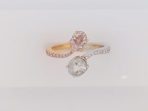 Lady's Two Tone 18 Karat Contemporary Fashion Ring Size 7 one 0.50ct Oval SI2 Pink Diamond