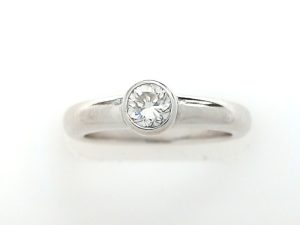 Lady's White 14 Karat Bezel Diamond Fashion Ring Size 6.5 With One = 0.30Ct Round I Si2 Diamond