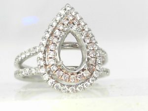 Lady's White 18 Karat Double Halo Split Shank Fashion Ring 
0.15tw Round SI3  Natural Pink Diamonds
0.48tw Round G/H SI2 Natrual Diamonds