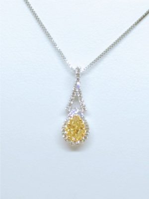 Two Tone 18 Karat Drop Pendant With One 0.30Ct Pear Si1 Intense Yellow Diamond And 34=0.16Tw Round G Si2 Diamonds