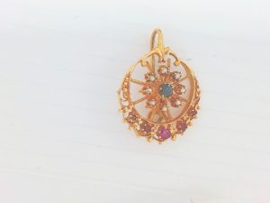 Lady's Yellow 14 Karat Vintage Pendant With One = Round Sapphire And 5 = Round Rubys