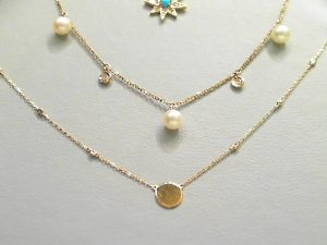 Lady's Yellow 14 Karat Disk Necklace With 0.04Tw Rose Cut Diamonds Style: Cable Link
Metal: 14 Karat
Color: Yellow
Finish: Polished
Length: 18