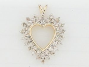 Lady's Yellow 14 Karat Diamond Heart Necklace With 40 = 0.80Tw Round I Si2 Diamonds Style: Curb
Metal: 14 Karat
Color: Yellow
Finish: Polished
Length: 18