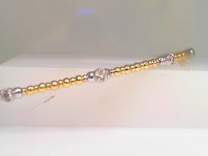 Lady's Yellow 14 Karat Bangle Bracelet With 1.50Tw Round G/H Si2 Diamonds