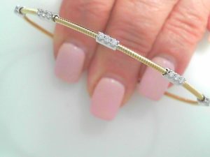 GEMMA COUTURE Lady's Two Tone Yellow/White 14 Karat 5 Station On Wire Flexy Bracelet With Diamonds Bracelet 15 = 0.23tw Round G SI1 Diamonds
