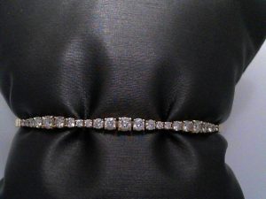 Lady's Yellow 14 Karat Flex Bangle Bracelet 22 = 1.15tw Round G/H SI2 Diamonds