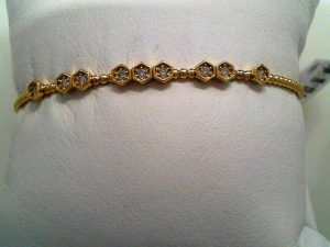 Lady's Yellow 14 Karat Flex  9 Honeycomb  Station Bangle Bracelet 9 = 0.32tw Round G/H SI2 Diamonds