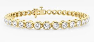 Lady's Yellow 14 Karat Tennis Bracelet Bezel Set Bracelet Length 6.5in 48 = 1.883tw Round G/H SI1 Diamonds