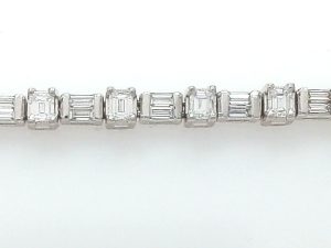 Lady's White Platinum Tennis Bracelet Length 7 With 20 = 3.00Tw Baguette F/G Si1 Diamonds And 38 = 1.50Tw Baguette F/G Si1 Diamonds Gram Weight: 24