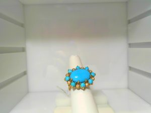 Lady's Yellow 18 Karat Geometric Fashion Ring Size 7 With 2.65Tw Oval and round Turquoise And 0.04Tw Round Diamonds