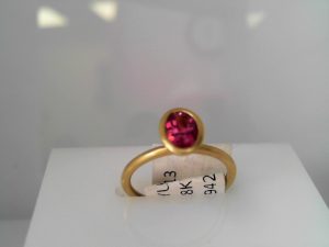 Lady's Yellow 18 Karat Matte' Fashion Ring Size 6 With One 0.74Ct Oval Pink Tourmaline