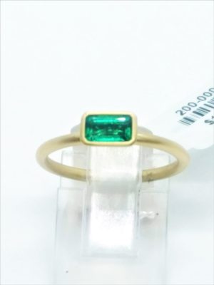 Lady's Yellow 18 Karat Satin Fashion Ring Size 6 With One 0.50Ct Emerald Emerald