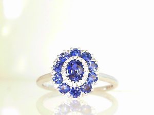 STUNNING 18 Karat White Gold Oval Double Halo Sapphire & Diamond Fashion Ring Size 6.5 one 0.42ct Oval Blue Sapphire
10=0.66tw Round Blue Sapphires
28=0.14tw Round G VS2 Diamonds