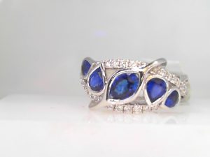 White 18 Karat Contemporary Fashion Ring Size 6.25 5=1.27tw Pear Blue Sapphires
36=0.31tw Round Diamonds