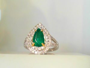 Lady's Two Tone 18 Karat Double Halo Split Shank Fashion Ring Size 6.5 one 01.34ct Pear GreenNatual Columbian Emerald
0.78tw Round G SI2 Natual Diamonds
