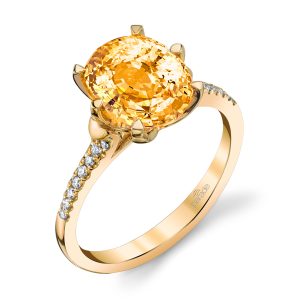 Carat Total Weight: 18-RD 0.08, 01-PeachSapp 2.41
Stone info: OV: 9x7
4.4GRM
An oval shaped Peach sapphire(2.41 ct) glows brightly atop a tapered white diamond band in 18k yellow gold in this sleek style from the Parade in Color Collection.
