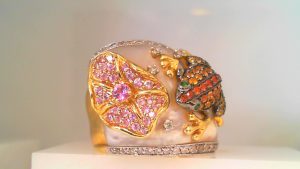 Lady's Yellow 14 Karat Free Form Fashion Ring Size 7.25
Forg & Flower ring with multi gemstones & Diamonds