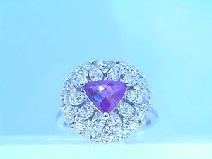 Lady's White Platinum Contemporary Fashion Ring Size 7 one 1.12ct Trillian Purple Sapphire
0.90tw Various Shapes Diamonds
8.90 Grams Platinum